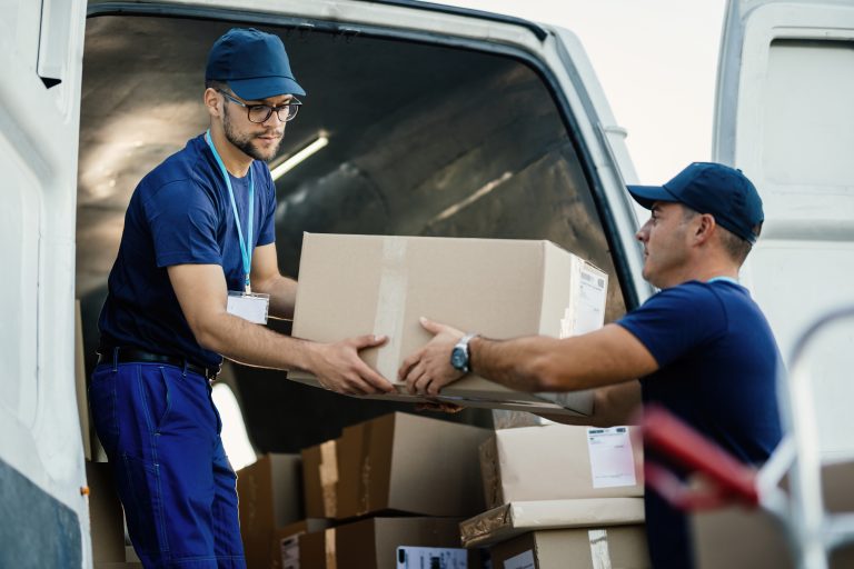 After-arrival Services - Couriers loading boxes